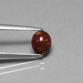 0.43 карата, натуральный Многоцветный Шоколадный опал, Огранка Овал, Непрозрачный