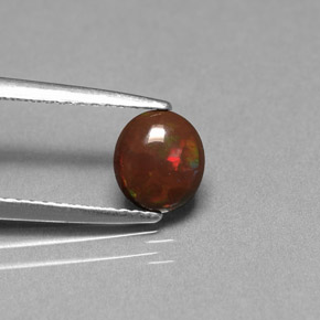 0.44 карата, натуральный Многоцветный Шоколадный опал, Огранка Овал, Непрозрачный