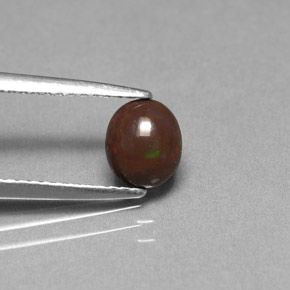 0.49 карата, натуральный Многоцветный Шоколадный опал, Огранка Овал, Непрозрачный