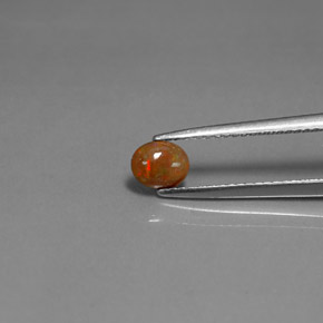 0.34 карата, натуральный Многоцветный Шоколадный опал, Огранка Овал, Непрозрачный