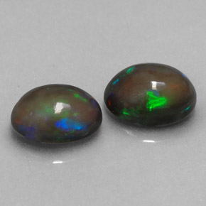  карата, натуральный Многоцветный Шоколадный опал, Огранка Овал, Полупрозрачный
