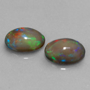  карата, натуральный Многоцветный Шоколадный опал, Огранка Овал, Полупрозрачный