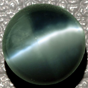 Натуральный зелёный chrysoberyl cat's eye 4,08 карата огранка овал, полупрозрачный