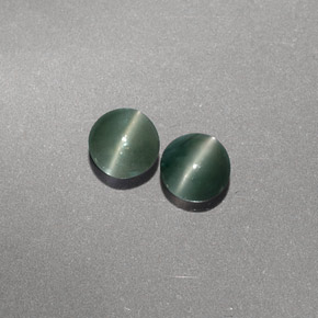 Натуральный зелёный chrysoberyl cat's eye  карата прозрачный, полупрозрачный