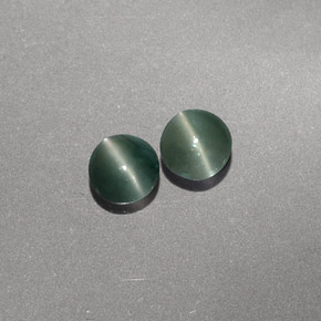 Натуральный зелёный chrysoberyl cat's eye  карата прозрачный, полупрозрачный