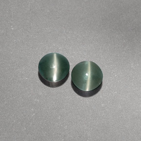 Натуральный зелёный chrysoberyl cat's eye  карата прозрачный, полупрозрачный