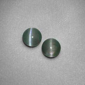 Натуральный зелёный chrysoberyl cat's eye  карата прозрачный, полупрозрачный