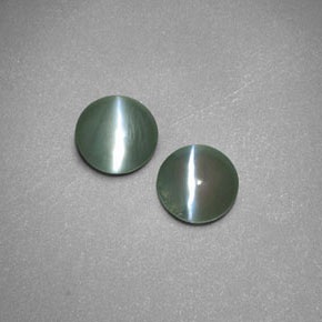 Натуральный зелёный chrysoberyl cat's eye  карата прозрачный, полупрозрачный
