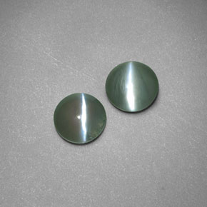 Натуральный зелёный chrysoberyl cat's eye  карата прозрачный, полупрозрачный
