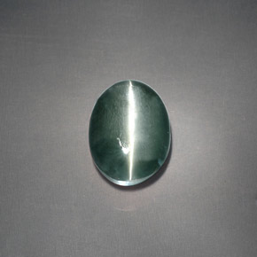 Натуральный зелёный chrysoberyl cat's eye 3,05 карата огранка овал, непрозрачный