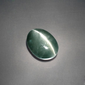 Натуральный зелёный chrysoberyl cat's eye 3,05 карата огранка овал, непрозрачный