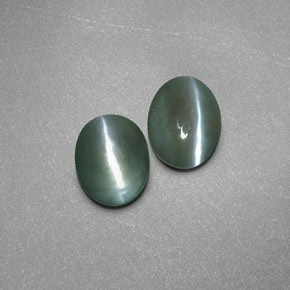 Натуральный зелёный chrysoberyl cat's eye  карата прозрачный, полупрозрачный