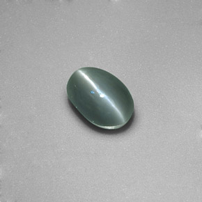 Натуральный зелёный chrysoberyl cat's eye 0,86 карата прозрачный, полупрозрачный