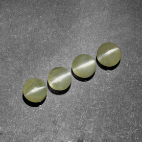 Натуральный зелёный chrysoberyl cat's eye  карата прозрачный, полупрозрачный