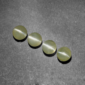 Натуральный зелёный chrysoberyl cat's eye  карата прозрачный, полупрозрачный