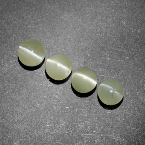 Натуральный зелёный chrysoberyl cat's eye  карата прозрачный, полупрозрачный
