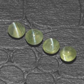 Натуральный зелёный chrysoberyl cat's eye 1,42 карата огранка круг, полупрозрачный
