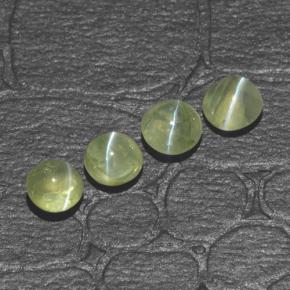 Натуральный зелёный chrysoberyl cat's eye 1,42 карата огранка круг, полупрозрачный