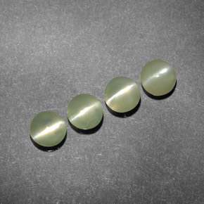Натуральный зелёный chrysoberyl cat's eye  карата прозрачный, полупрозрачный