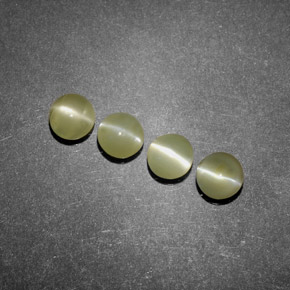 Натуральный зелёный chrysoberyl cat's eye  карата прозрачный, полупрозрачный