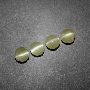 Натуральный зелёный chrysoberyl cat's eye  карата прозрачный, полупрозрачный