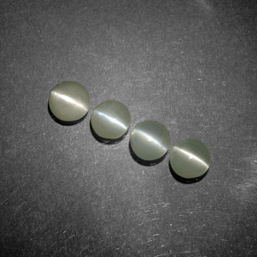 Натуральный зелёный chrysoberyl cat's eye  карата прозрачный, полупрозрачный