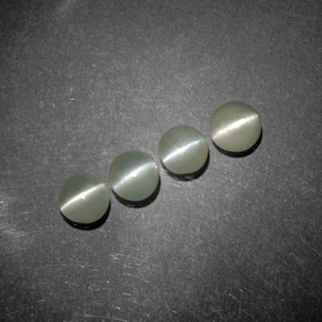Натуральный зелёный chrysoberyl cat's eye  карата прозрачный, полупрозрачный