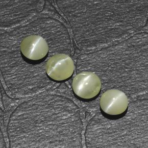Натуральный зелёный chrysoberyl cat's eye 1,54 карата огранка круг, полупрозрачный
