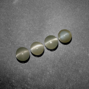 Натуральный зелёный chrysoberyl cat's eye 1,38 карата прозрачный, полупрозрачный
