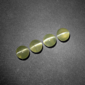 Натуральный зелёный chrysoberyl cat's eye  карата прозрачный, полупрозрачный