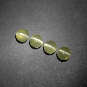 Натуральный зелёный chrysoberyl cat's eye  карата прозрачный, полупрозрачный