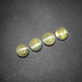 Натуральный зелёный chrysoberyl cat's eye  карата прозрачный, полупрозрачный