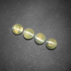 Натуральный зелёный chrysoberyl cat's eye  карата прозрачный, полупрозрачный