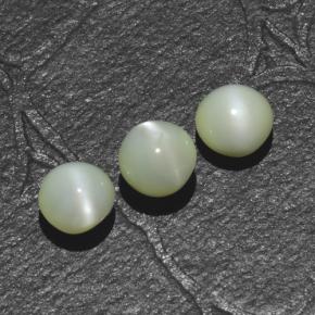 Натуральный зелёный chrysoberyl cat's eye 1,44 карата огранка круг, полупрозрачный