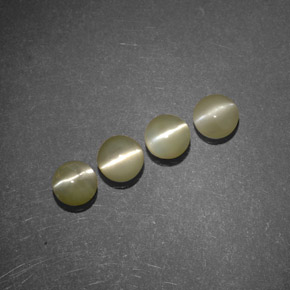 Натуральный зелёный chrysoberyl cat's eye 1,51 карата прозрачный, полупрозрачный