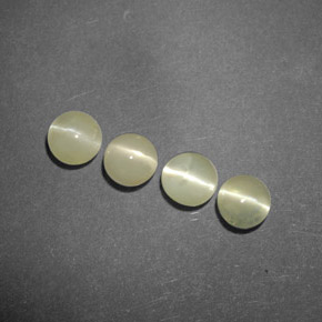 Натуральный зелёный chrysoberyl cat's eye  карата прозрачный, полупрозрачный