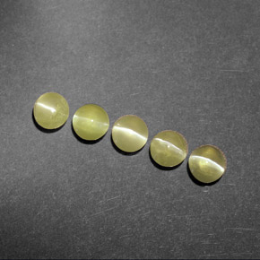 Натуральный зелёный chrysoberyl cat's eye  карата прозрачный, полупрозрачный