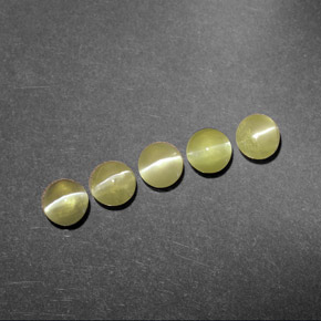 Натуральный зелёный chrysoberyl cat's eye  карата прозрачный, полупрозрачный
