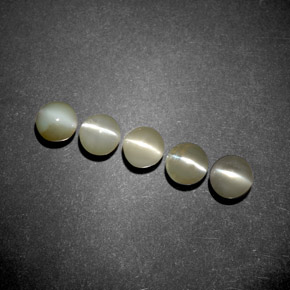 Натуральный зелёный chrysoberyl cat's eye  карата прозрачный, полупрозрачный