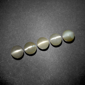 Натуральный зелёный chrysoberyl cat's eye  карата прозрачный, полупрозрачный