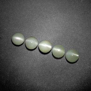 Натуральный зелёный chrysoberyl cat's eye  карата прозрачный, полупрозрачный