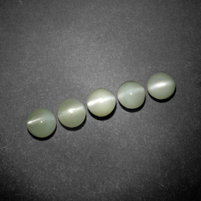 Натуральный зелёный chrysoberyl cat's eye  карата прозрачный, полупрозрачный