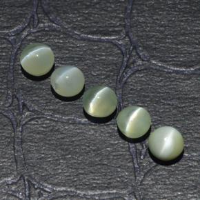 Натуральный зелёный chrysoberyl cat's eye 2,53 карата огранка круг, полупрозрачный