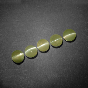 Натуральный зелёный chrysoberyl cat's eye  карата прозрачный, полупрозрачный