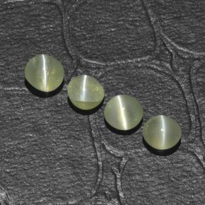 Натуральный зелёный chrysoberyl cat's eye 1,48 карата огранка круг, полупрозрачный