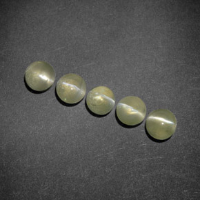 Натуральный зелёный chrysoberyl cat's eye 2,24 карата прозрачный, полупрозрачный