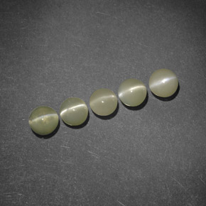 Натуральный зелёный chrysoberyl cat's eye  карата прозрачный, полупрозрачный