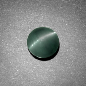 Натуральный зелёный chrysoberyl cat's eye 1,08 карата огранка круг, непрозрачный