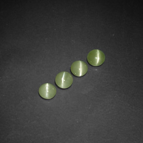 Натуральный зелёный chrysoberyl cat's eye  карата прозрачный, полупрозрачный