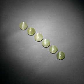 Натуральный зелёный chrysoberyl cat's eye  карата прозрачный, полупрозрачный